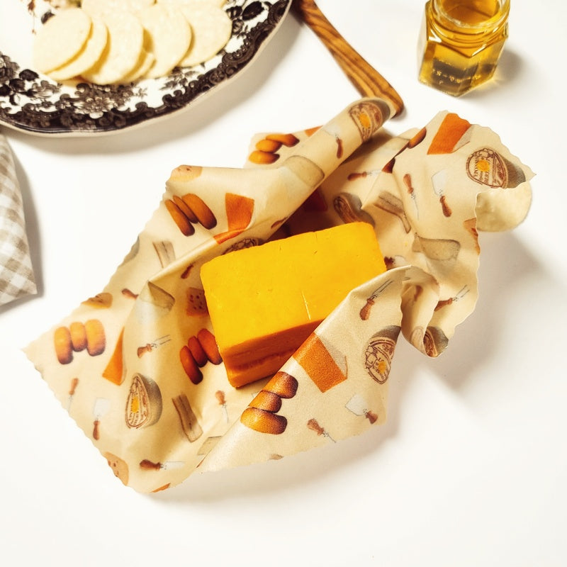 Cheese wrapped in beeswax food wrap